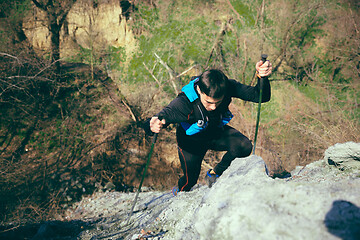 Image showing Hiker - man hiking in forest.