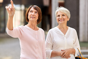 Image showing senior women with shopping bags in tallinn city