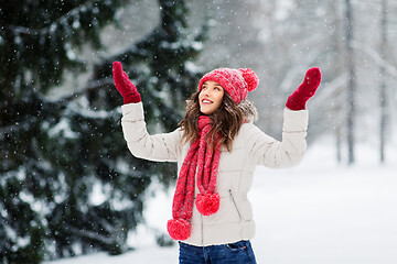 Image showing happy young woman in winter park