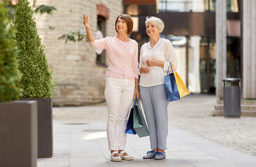 Image showing senior women with shopping bags in tallinn city