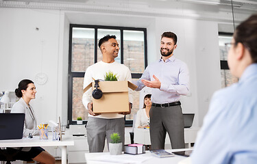 Image showing new male employee meeting colleagues at office