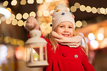 Image showing happy little girl at christmas with lantern market