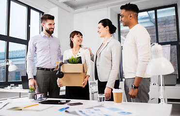 Image showing new female employee meeting colleagues at office