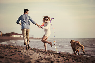 Image showing happy couple enjoying time together at beach