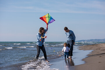 Image showing happy family enjoying vecation during autumn day