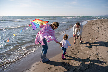 Image showing happy family enjoying vecation during autumn day