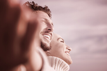 Image showing Loving young couple on a beach at autumn sunny day