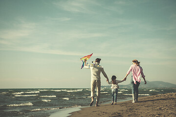 Image showing happy family enjoying vecation during autumn day