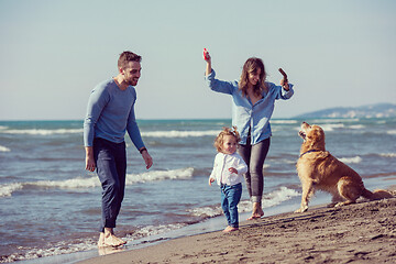 Image showing happy young family enjoying vecation during autumn day