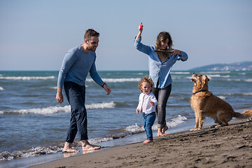 Image showing happy young family enjoying vecation during autumn day