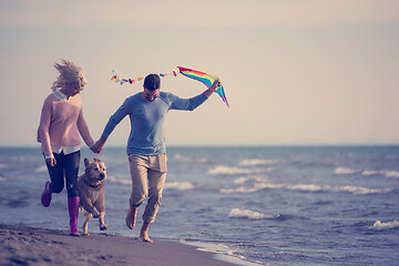 Image showing happy couple enjoying time together at beach