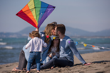 Image showing happy family enjoying vecation during autumn day