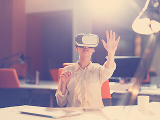 Image showing businesswoman using VR-headset glasses of virtual reality