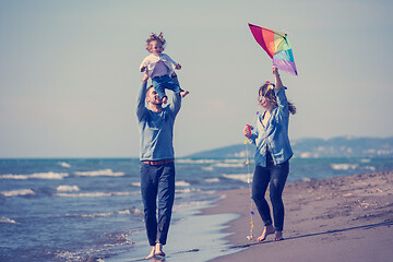 Image showing happy family enjoying vecation during autumn day