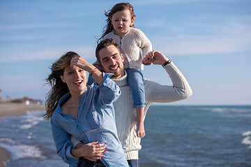 Image showing Young family enjoying vecation during autumn