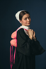 Image showing Medieval young woman as a nun with bra