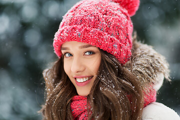 Image showing smiling teenage girl outdoors in winter