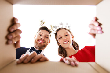 Image showing happy couple opening christmas gift box