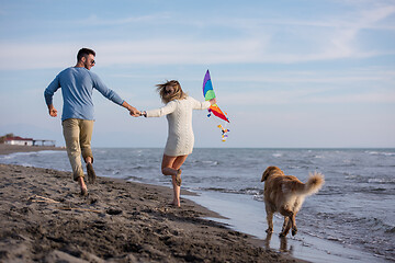 Image showing happy couple enjoying time together at beach