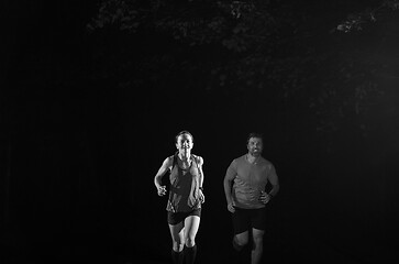 Image showing runners team on the night training