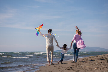 Image showing happy family enjoying vecation during autumn day