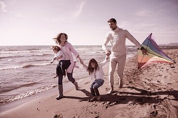 Image showing happy family enjoying vecation during autumn day