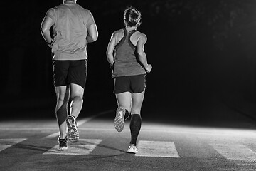 Image showing runners team on the night training