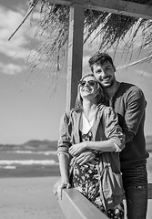 Image showing Couple chating and having fun at beach bar