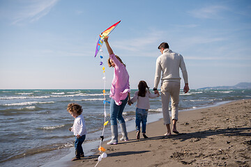 Image showing happy family enjoying vecation during autumn day