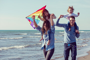 Image showing happy family enjoying vecation during autumn day