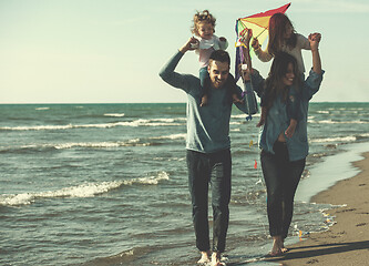 Image showing happy family enjoying vecation during autumn day