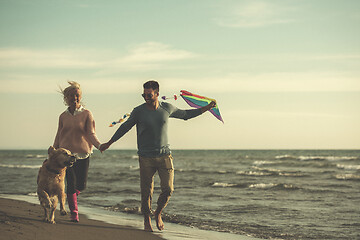 Image showing happy couple enjoying time together at beach