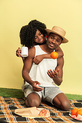 Image showing Happy family having picnic at studio