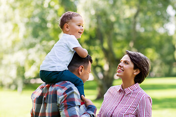 Image showing happy family having fun at summer park