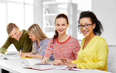 Image showing high school students with books and notebooks