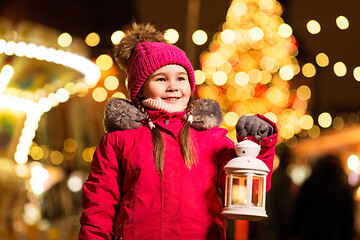 Image showing happy little girl at christmas with lantern market