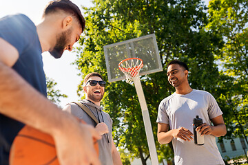 Image showing group of male friends going to play basketball