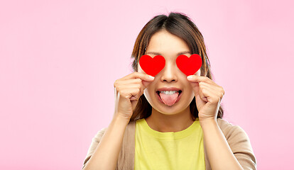 Image showing happy woman with eyes of hearts