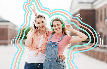 Image showing teenage girls or friends in headphones in city