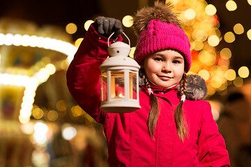 Image showing happy little girl at christmas with lantern market