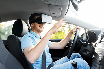 Image showing man or driver wearing vr glasses and driving car