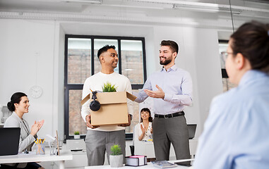 Image showing new male employee meeting colleagues at office