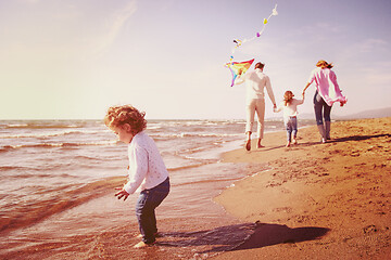 Image showing happy family enjoying vecation during autumn day