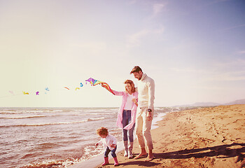 Image showing happy family enjoying vecation during autumn day