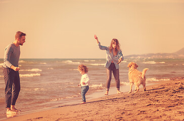 Image showing happy young family enjoying vecation during autumn day