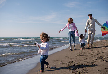 Image showing happy family enjoying vecation during autumn day