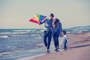 Image showing happy family enjoying vecation during autumn day