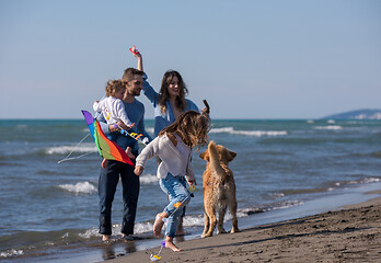 Image showing happy young family enjoying vecation during autumn day