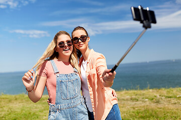 Image showing teenage girls or friends taking selfie in summer