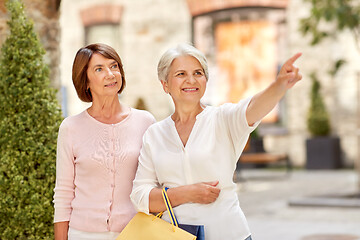 Image showing senior women with shopping bags in tallinn city